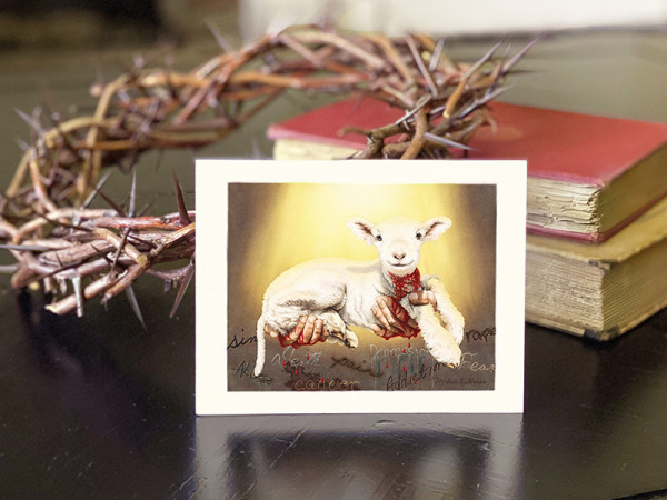 notecard of God's hands offering a slain lamb whose blood drips on 9 tragic words.