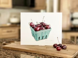 art print of fresh cherries in a green carton